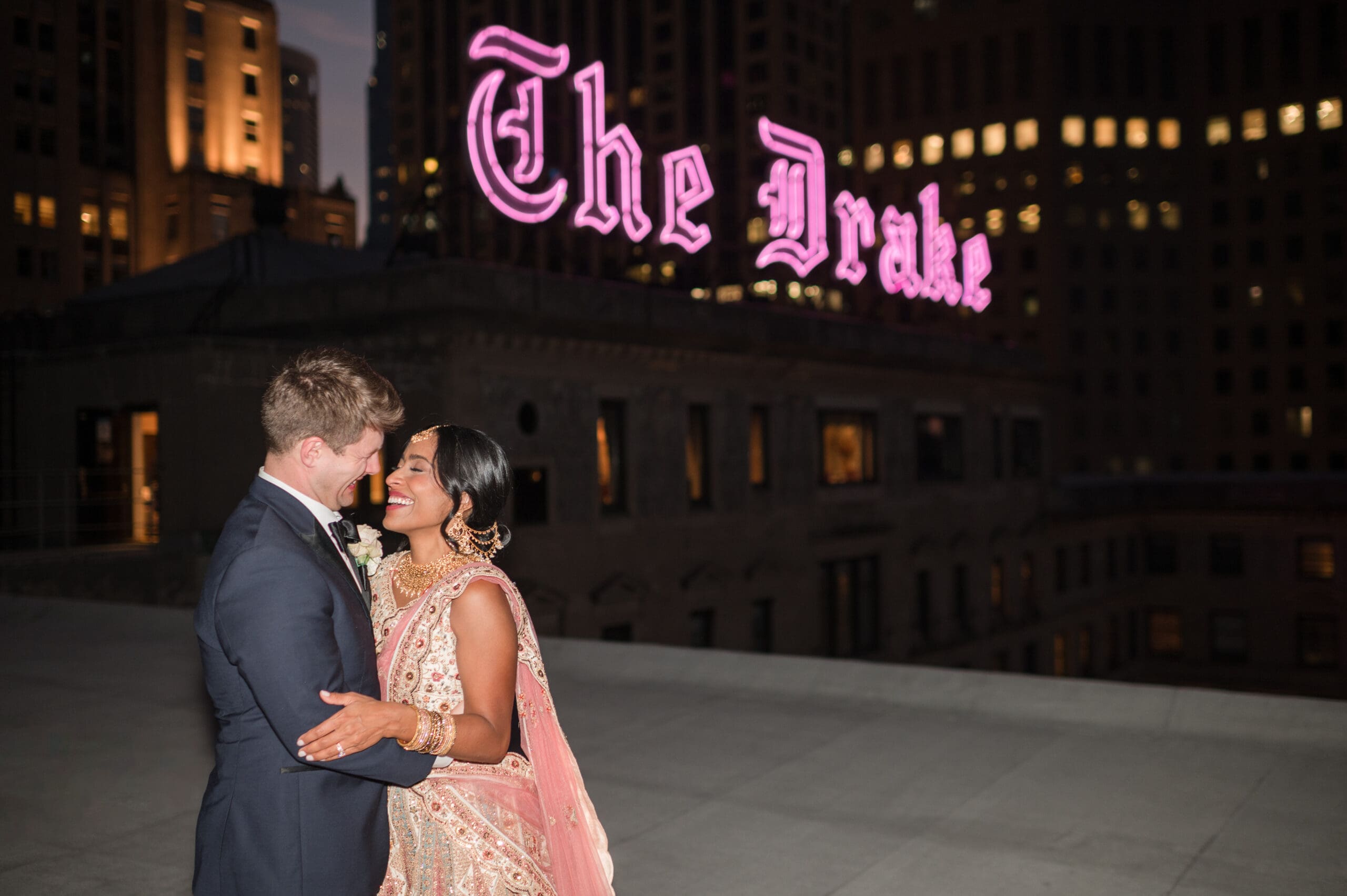 Bride and groom sharing a special moment on the rooftop of the Drake Hotel